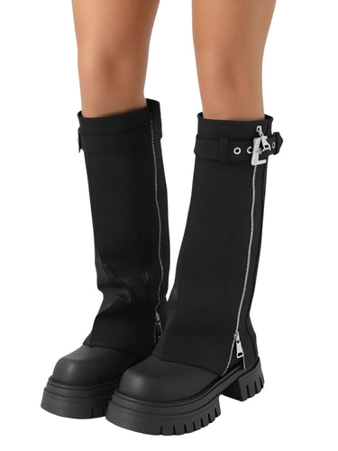 Black knee-high boots with zippers on a white background